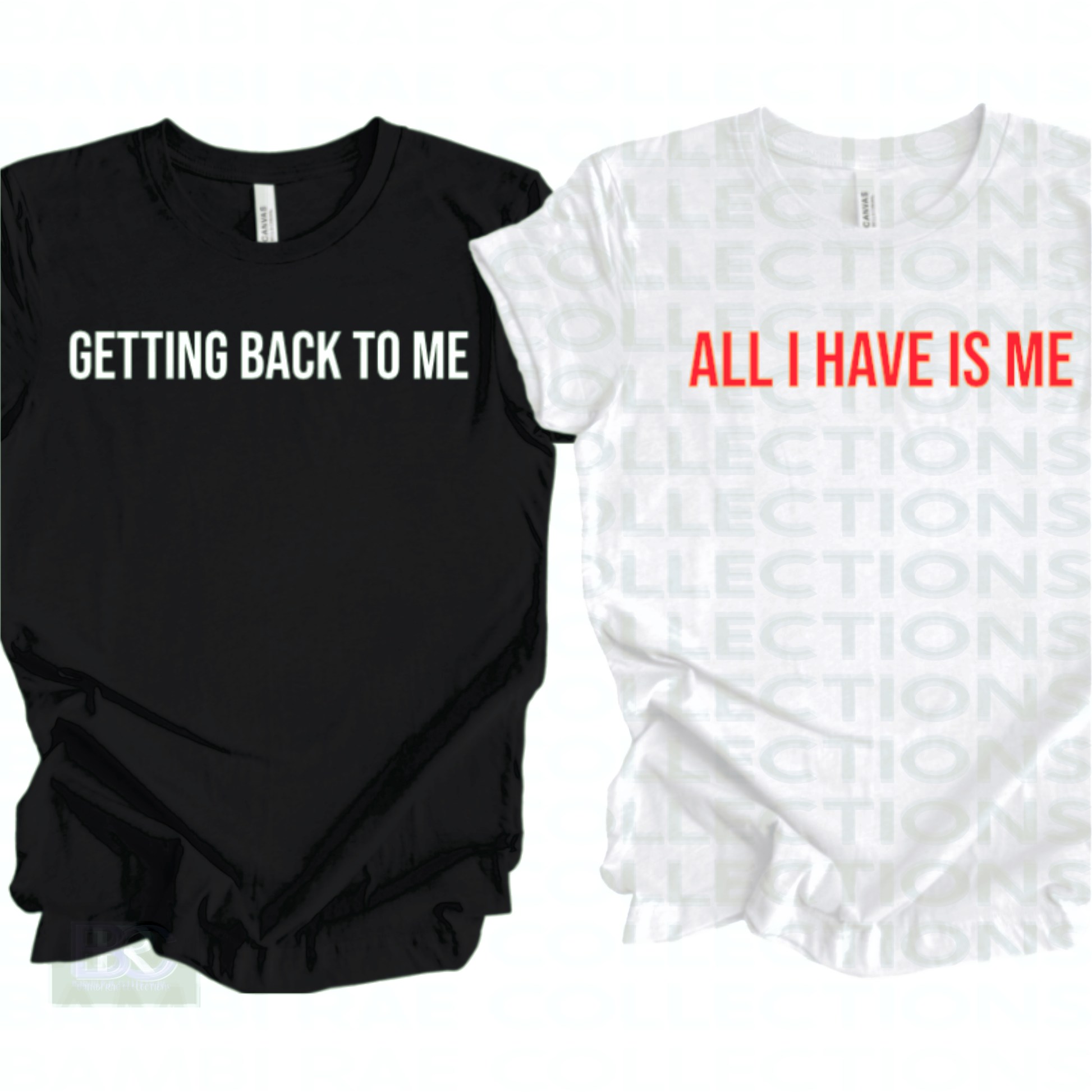 one black shirt with the words "getting back to me" in white lettering on it, and one white shirt with the words " all I have is me"  in red lettering on it